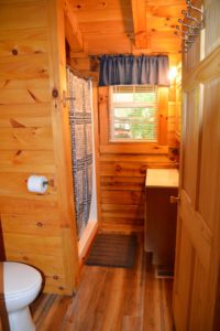 bathroom in The Landing log cabin