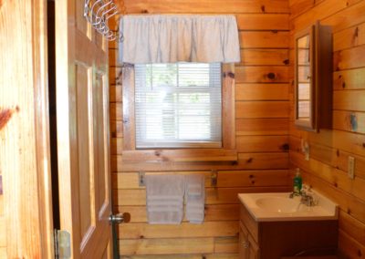 bathroom in The Overlook log cabin