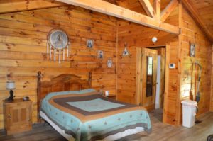 bedroom in The Lakota log cabin in Hocking Hills