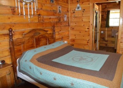 bedroom in The Lakota log cabin