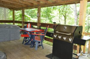 deck with gas grill at Silverwolf log cabin